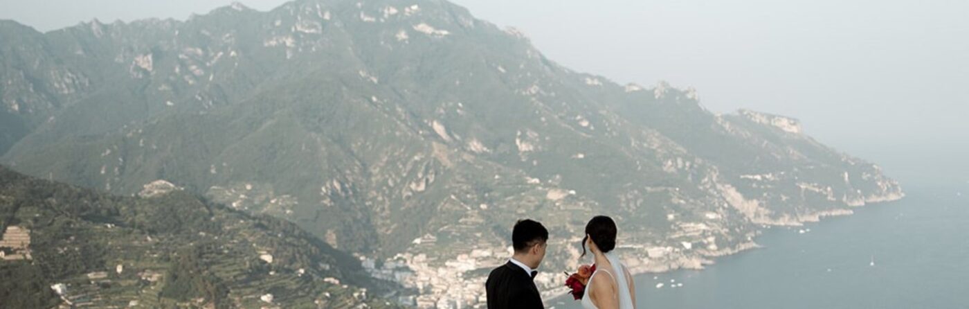 Bride and groom looking out over the Amalfi Coast