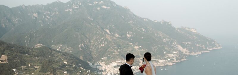 Bride and groom looking out over the Amalfi Coast